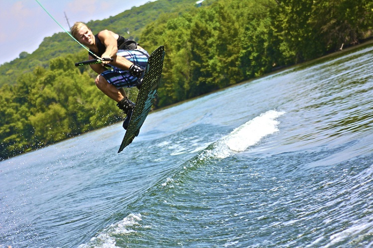 Wakeboarding - A Wakeboarder Gets Some Air